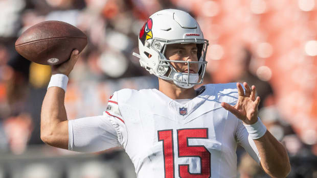 Arizona Cardinals quarterback Clayton Tune (15) warms up before the game between the Cardinals and the Cleveland Browns at Cleveland Browns Stadium.